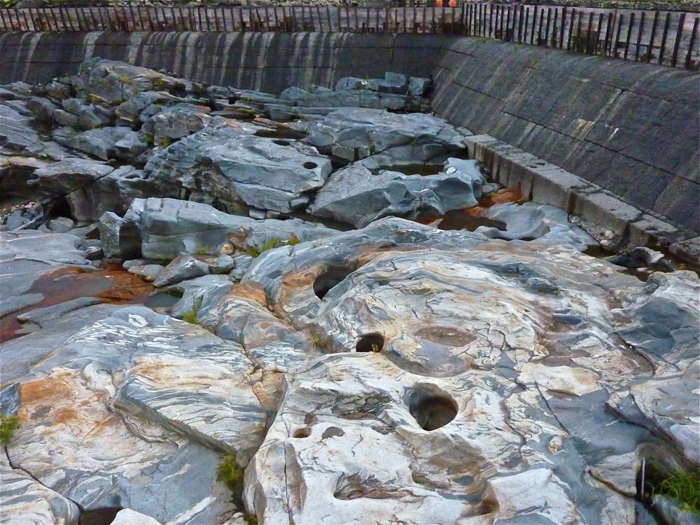 The Ancient Glacial Potholes in Shelburne Falls, massachusetts features potholes as wide as 39 feet.