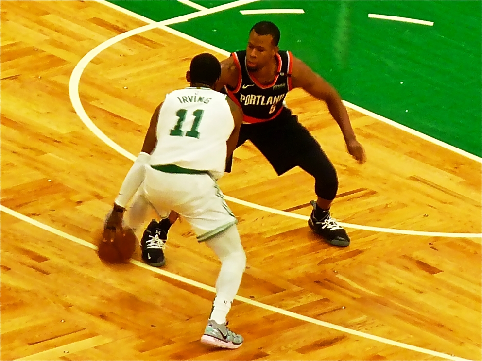 Celtics point guard Kyrie Irving does a bit of razzle dazzle on the court at the TD Garden in Boston, Massachusetts.