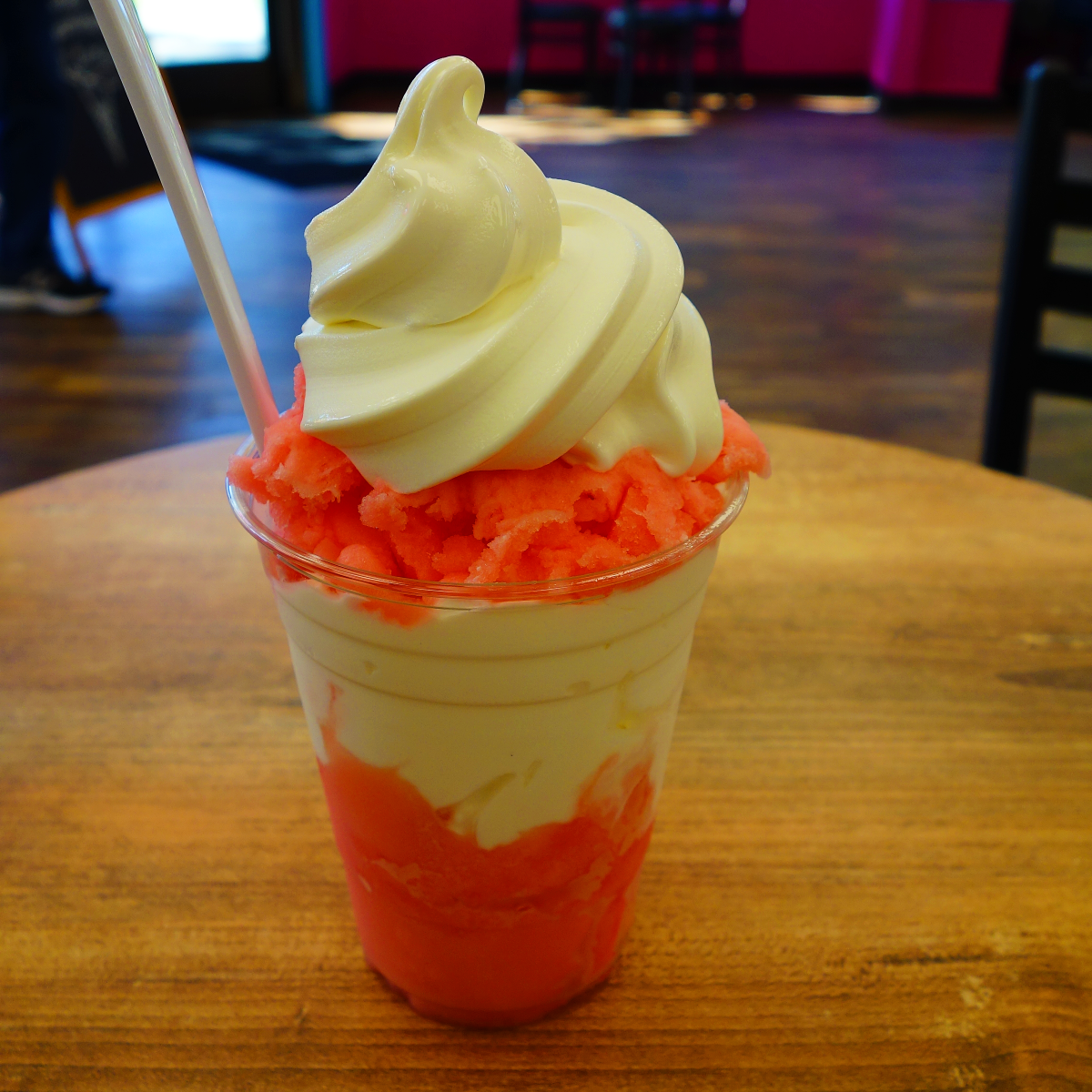 Strawberry lemonade Italian Ice with soft serve vanilla ice cream and whipped cream from Daddy's Dairy in Norwood, Mass.