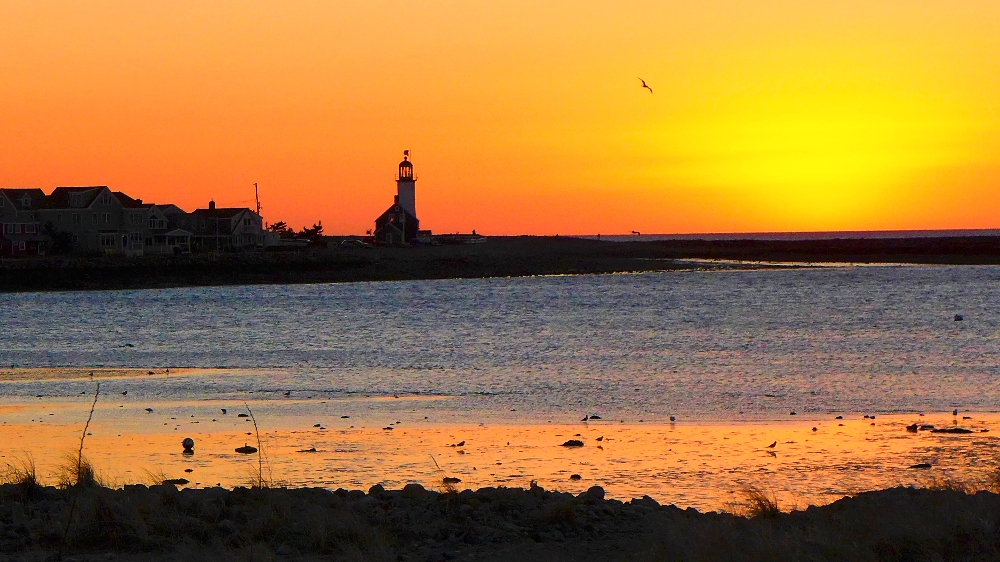 Sunrise at Scituate Lighthouse in Scituate, Massachusetts.