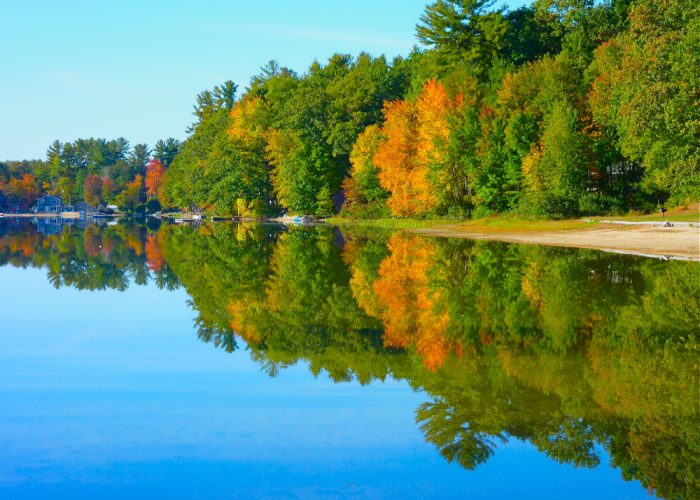 An autumn foliage scene at Silver Lake in Hollis, N.H.