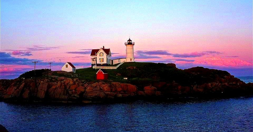 Precious moment at Nubble Lighthouse in York Beach, Maine at the end of the day.
